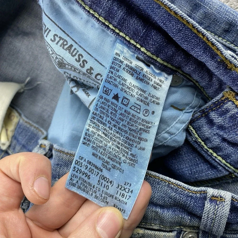 Levi's 519 Slim Jeans Mens 32X34‎ Blue Medium Wash Low Rise Distressed